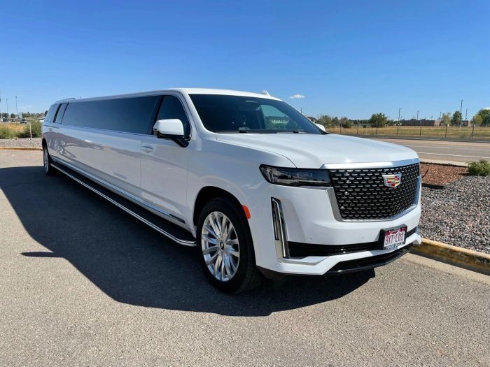 White Escalade stretch limo – Monument party bus rental